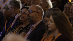 A group of delegates listen to a talk at a Business Summit in York